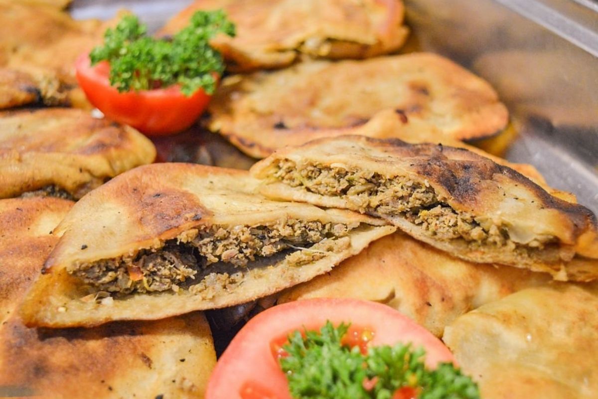 Egyptian Hawawshi stuffed pita bread with spiced minced meat grilled to perfection